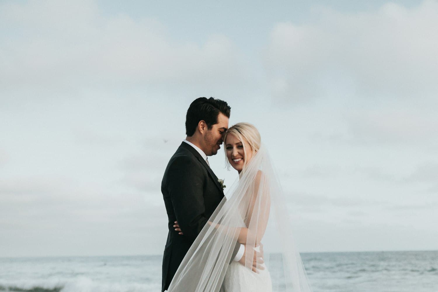 Bride and groom sharing a quiet moment after the ceremony