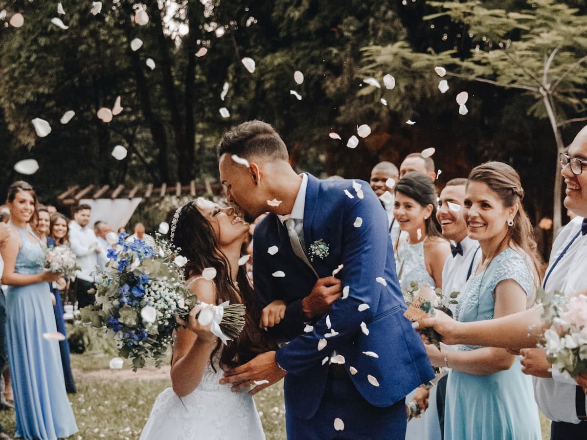 Wedding couple's first dance under string lights